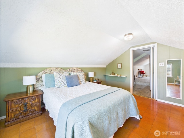 1006 E Harrison St, Tacoma, WA 98404 - bedroom with lofted ceiling and a textured ceiling
