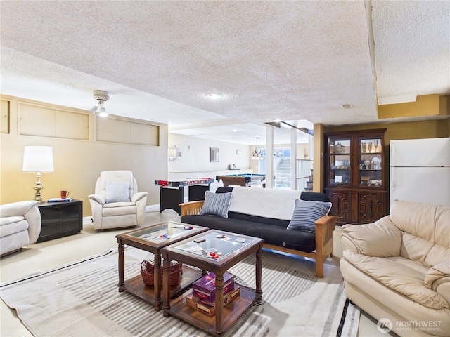1006 E Harrison St, Tacoma, WA 98404 - living area with a textured ceiling and carpet