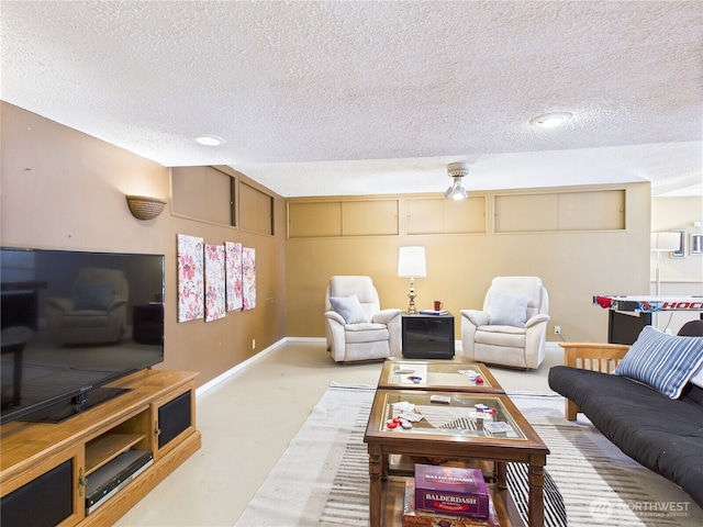1006 E Harrison St, Tacoma, WA 98404 - living room featuring a textured ceiling and concrete flooring