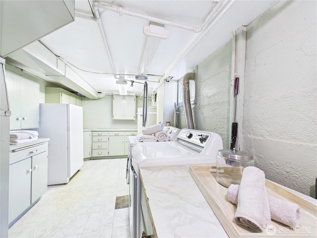 1006 E Harrison St, Tacoma, WA 98404 - laundry room with washer and dryer and cabinet space