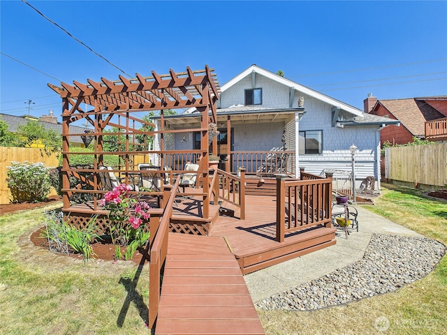 1006 E Harrison St, Tacoma, WA 98404 - rear view of house with a wooden deck and a pergola