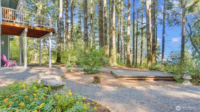 250 E Crest Ln, Grapeview, WA 98546 - view of yard with a wooden deck