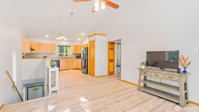 250 E Crest Ln, Grapeview, WA 98546 - kitchen with freestanding refrigerator, light brown cabinets, recessed lighting, backsplash, and light wood-style floors