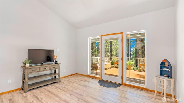 250 E Crest Ln, Grapeview, WA 98546 - doorway featuring wood finished floors and vaulted ceiling