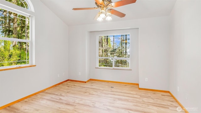 250 E Crest Ln, Grapeview, WA 98546 - spare room with wood finished floors, lofted ceiling, and a ceiling fan