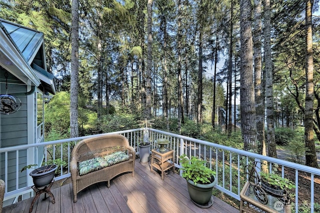 250 E Crest Ln, Grapeview, WA 98546 - wooden deck featuring view of scattered trees