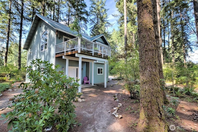250 E Crest Ln, Grapeview, WA 98546 - back of house with a wooden deck