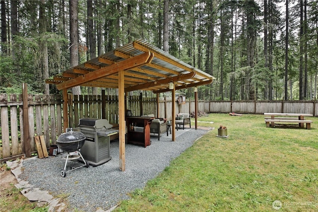4907 Pinewood Cir, Langley, WA 98260 - fenced backyard featuring a wooded view