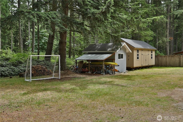 4907 Pinewood Cir, Langley, WA 98260 - view of shed featuring a wooded view