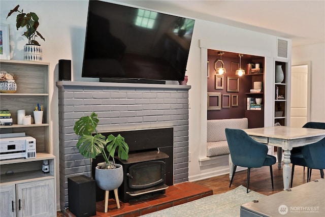 4907 Pinewood Cir, Langley, WA 98260 - living area with wood finished floors and a wood stove