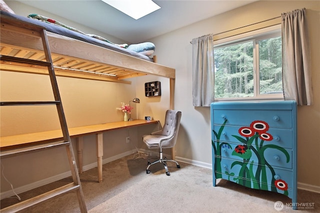 4907 Pinewood Cir, Langley, WA 98260 - carpeted home office featuring a skylight and baseboards