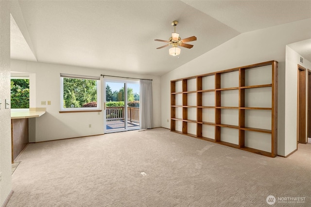 5125 Viewridge Dr SE, Olympia, WA 98501 - empty room with lofted ceiling, carpet flooring, and a ceiling fan