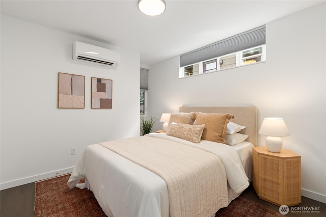 410A 10th Ave E, Seattle, WA 98102 - bedroom with an AC wall unit and wood finished floors