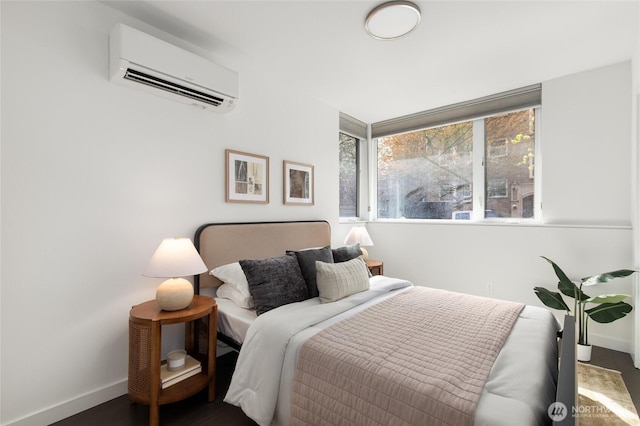 410A 10th Ave E, Seattle, WA 98102 - bedroom featuring an AC wall unit and baseboards