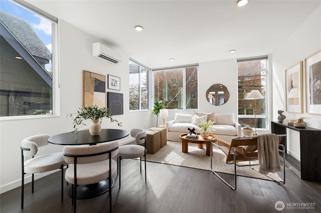 410A 10th Ave E, Seattle, WA 98102 - living room featuring a wall mounted air conditioner, dark wood-style floors, and recessed lighting