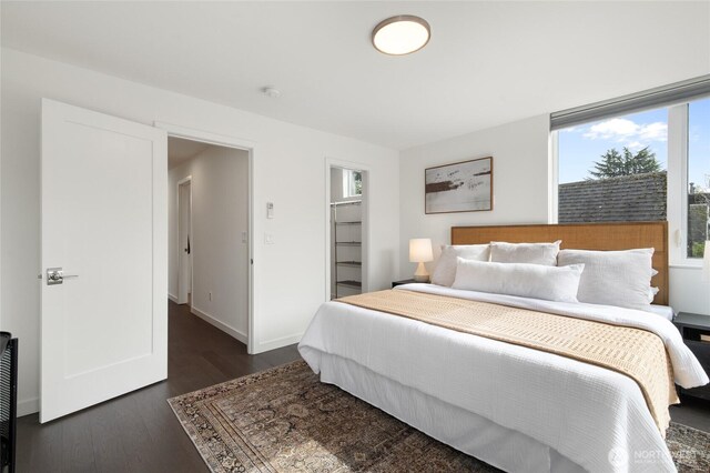 410A 10th Ave E, Seattle, WA 98102 - bedroom featuring dark wood-type flooring and baseboards