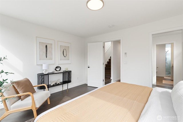 410A 10th Ave E, Seattle, WA 98102 - bedroom featuring dark wood finished floors and baseboards