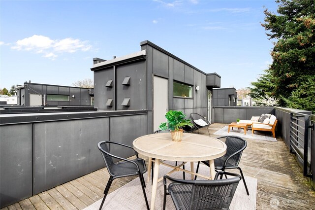 410A 10th Ave E, Seattle, WA 98102 - wooden deck with outdoor lounge area and outdoor dining area