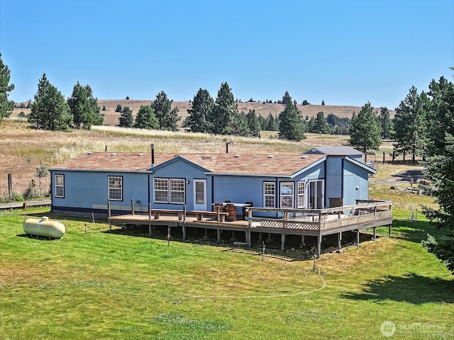 55 Mott Rd, Lyle, WA 98635 - rear view of house with a wooden deck, a yard, and a view of countryside