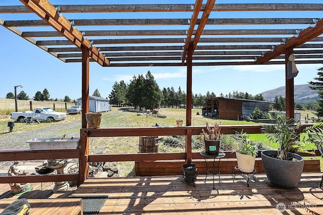 55 Mott Rd, Lyle, WA 98635 - deck featuring an outdoor structure, a pergola, and a mountain view