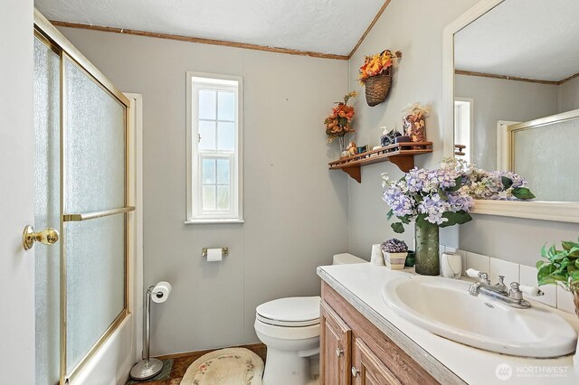 55 Mott Rd, Lyle, WA 98635 - full bath with ornamental molding, vanity, and shower / bath combination with glass door