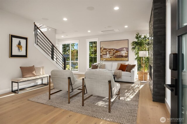 10505 NE 112th St, Kirkland, WA 98033 - living room featuring light wood-type flooring, recessed lighting, and stairs