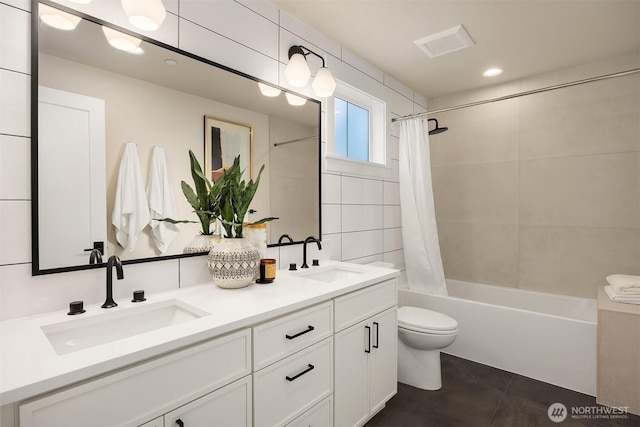 10505 NE 112th St, Kirkland, WA 98033 - bathroom featuring double vanity, shower / tub combo with curtain, tile patterned flooring, and recessed lighting