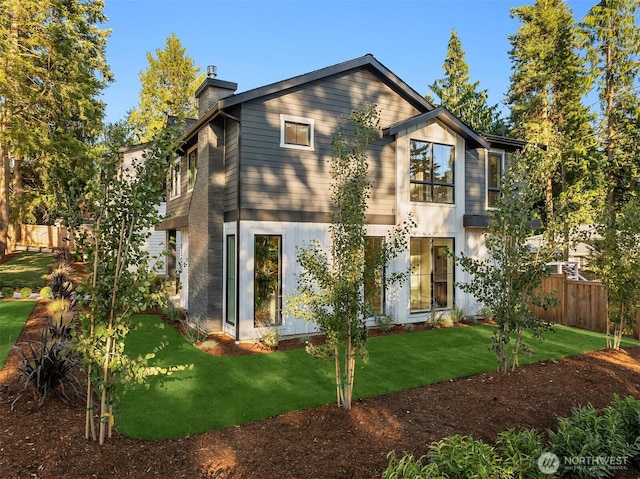 10505 NE 112th St, Kirkland, WA 98033 - rear view of house with a chimney
