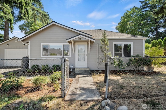 610 128th St S, Tacoma, WA 98444 - bungalow-style house with a garage and a shingled roof