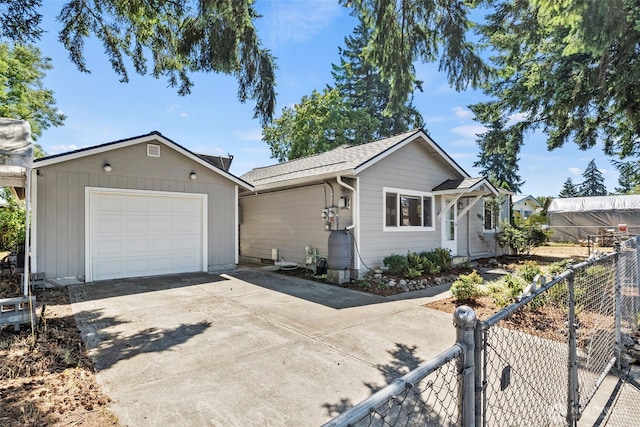 610 128th St S, Tacoma, WA 98444 - ranch-style house featuring concrete driveway and a garage