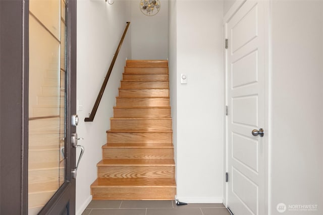 3312 156th St SW Unit E4, Lynnwood, WA 98087 - staircase featuring tile patterned flooring and baseboards