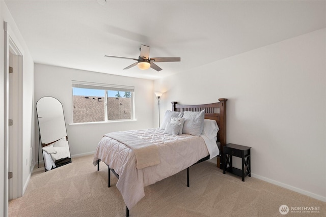 3312 156th St SW Unit E4, Lynnwood, WA 98087 - carpeted bedroom with baseboards and a ceiling fan