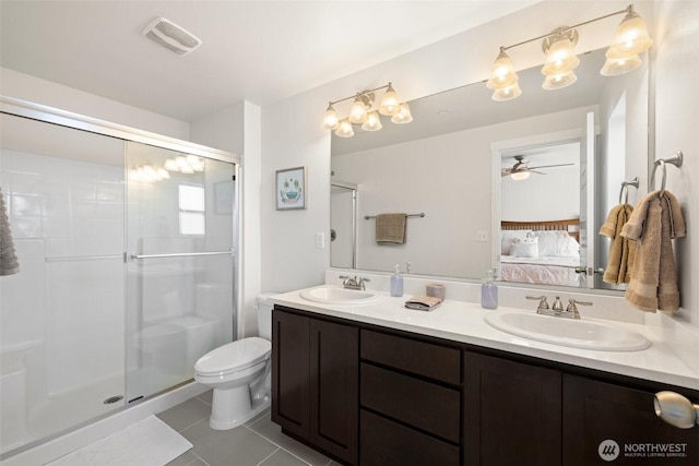 3312 156th St SW Unit E4, Lynnwood, WA 98087 - ensuite bathroom featuring tile patterned flooring, double vanity, a stall shower, and ceiling fan