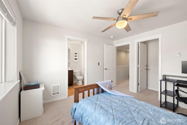 3312 156th St SW Unit E4, Lynnwood, WA 98087 - bedroom with carpet flooring, connected bathroom, and ceiling fan