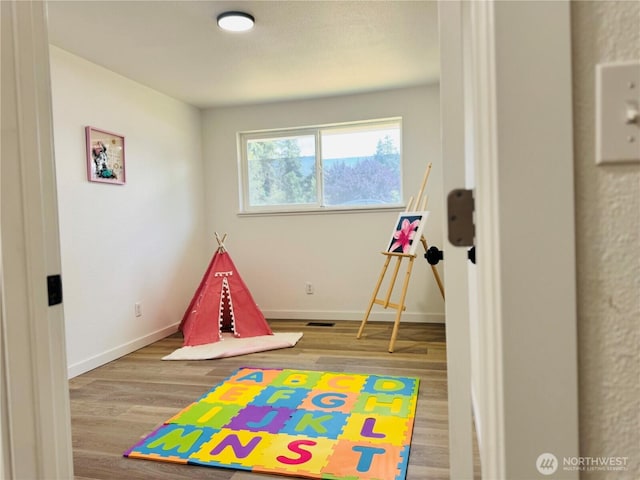 12706 94th Ave E, Puyallup, WA 98373 - playroom featuring wood finished floors