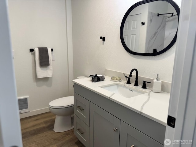 12706 94th Ave E, Puyallup, WA 98373 - full bath featuring vanity and wood finished floors