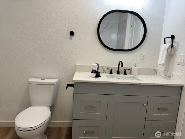 12706 94th Ave E, Puyallup, WA 98373 - bathroom featuring vanity and wood finished floors