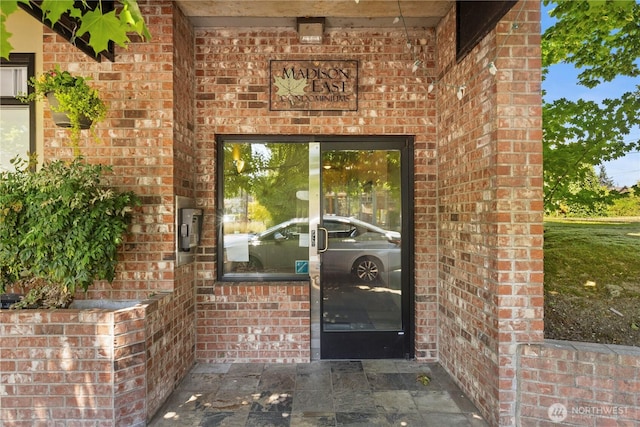 2820 E Madison St Unit 204, Seattle, WA 98112 - view of exterior entry with brick siding