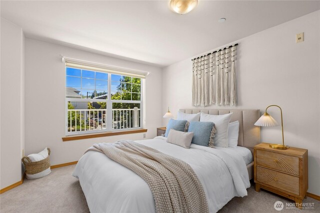 2820 E Madison St Unit 204, Seattle, WA 98112 - carpeted bedroom with baseboards