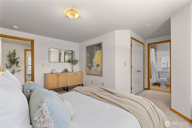 2820 E Madison St Unit 204, Seattle, WA 98112 - bedroom featuring light carpet and connected bathroom