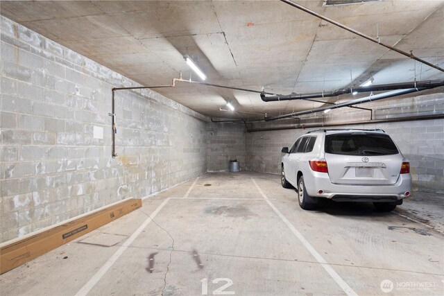 2820 E Madison St Unit 204, Seattle, WA 98112 - parking deck with concrete block wall