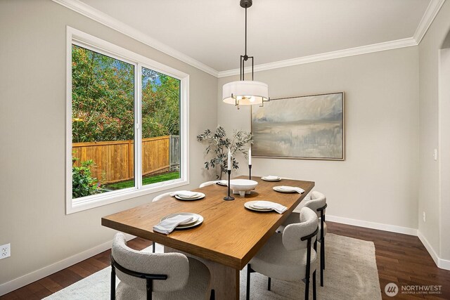 3606 Monterey Ct NE, Renton, WA 98056 - dining area featuring crown molding and dark wood-style flooring