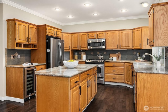3606 Monterey Ct NE, Renton, WA 98056 - kitchen featuring appliances with stainless steel finishes, wine cooler, dark wood finished floors, ornamental molding, and light stone countertops