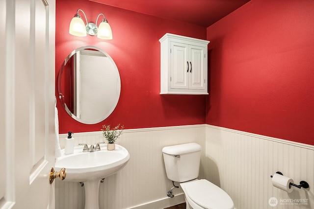 3606 Monterey Ct NE, Renton, WA 98056 - bathroom with wainscoting and toilet