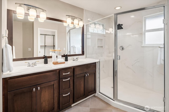 3606 Monterey Ct NE, Renton, WA 98056 - bathroom featuring a marble finish shower, double vanity, tile patterned flooring, and recessed lighting