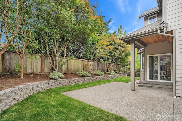 3606 Monterey Ct NE, Renton, WA 98056 - fenced backyard with a patio area