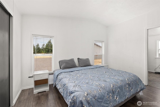 8222 Bordeaux Rd SW, Olympia, WA 98512 - bedroom with lofted ceiling and wood finished floors
