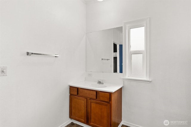 8222 Bordeaux Rd SW, Olympia, WA 98512 - bathroom with vanity and baseboards