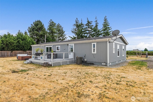 8222 Bordeaux Rd SW, Olympia, WA 98512 - rear view of house with a hot tub and a deck
