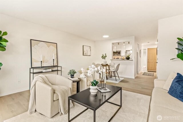 502 141st Ave SE Unit 45, Bellevue, WA 98007 - living area with light wood-type flooring and recessed lighting
